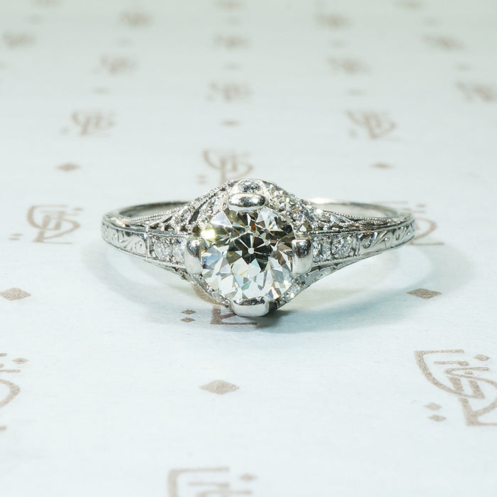 edwardian platinum filigree engagement ring set with oec diamond and flower diamond set details