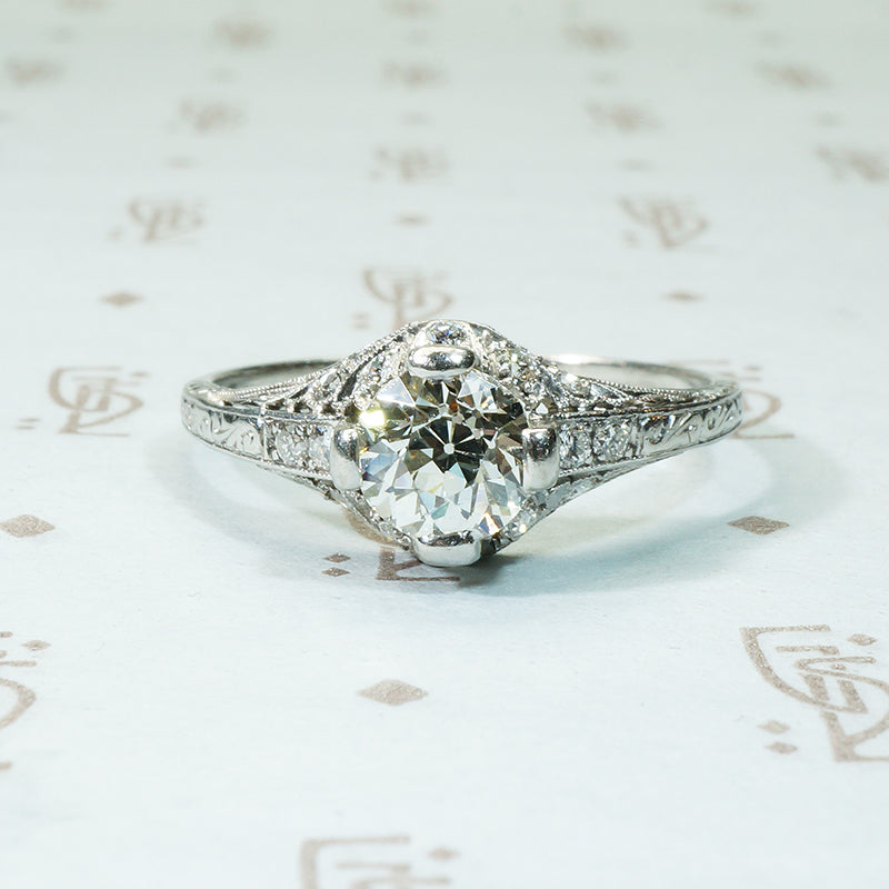 edwardian platinum filigree engagement ring set with oec diamond and flower diamond set details