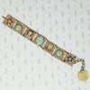 fun vintage egyptian themed bracelet brass filigree enamel and glass 
