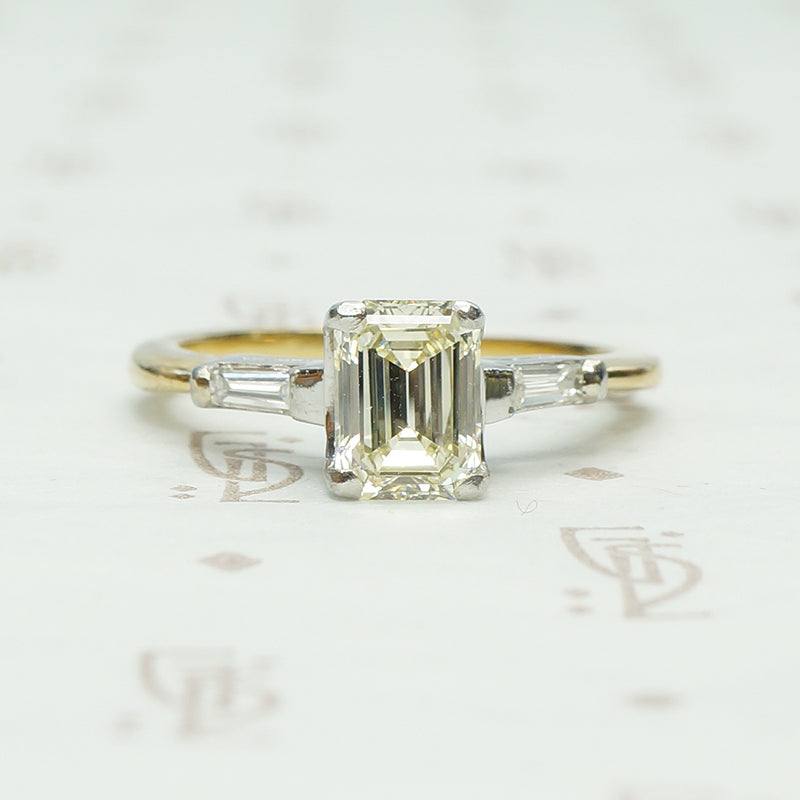 VVS2 U/V .97 carat emerald step cut gia crtified diamond engagement ring in 18k yellow gold and platinum