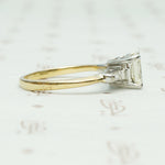 Classic and Unique Emerald Step Cut Diamond Ring