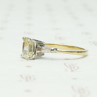 Classic and Unique Emerald Step Cut Diamond Ring