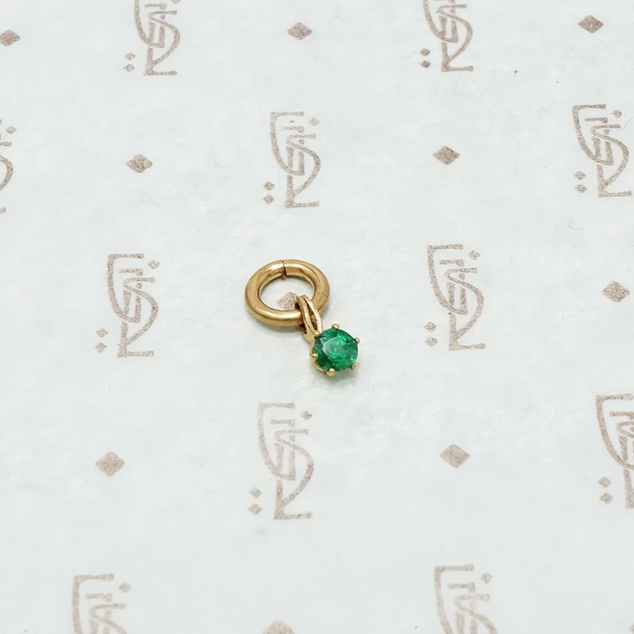 tiny emerald charm