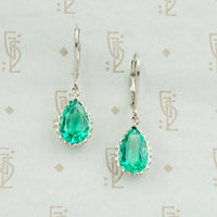 pear shaped emerald earrings platinum