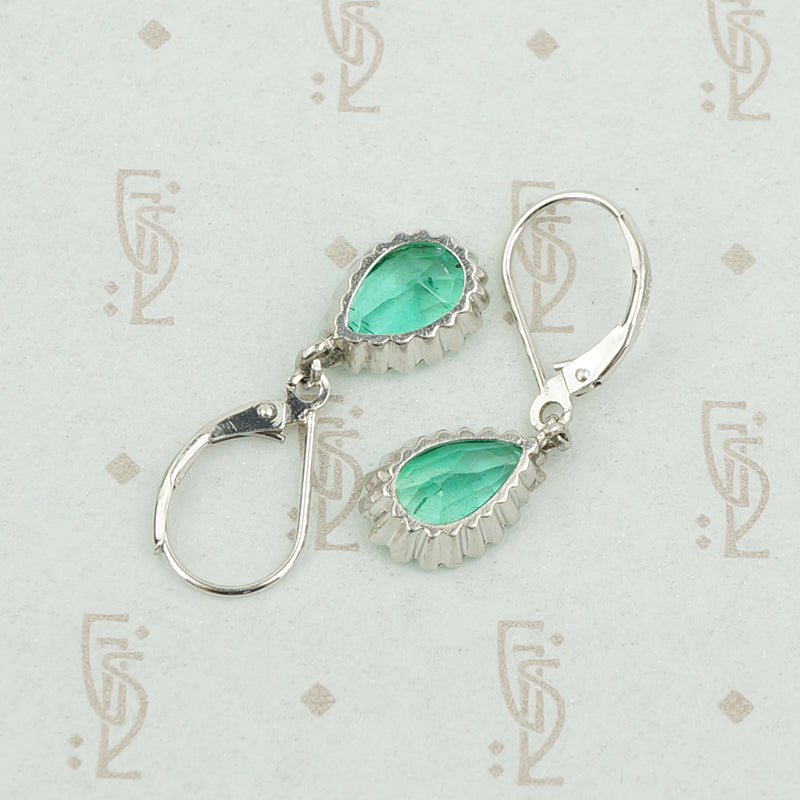 pear shaped emerald earrings platinum back view