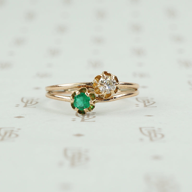 tulip set crossover ring emerald and diamond