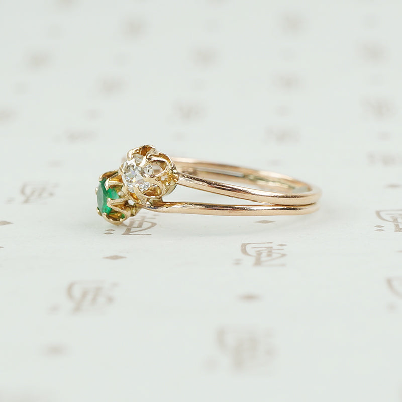 tulip set crossover ring emerald and diamond