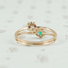 back view of emerald and diamond ring
