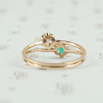 back view of emerald and diamond ring
