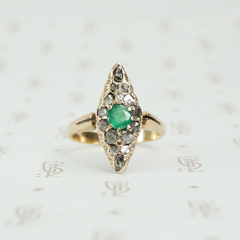 Old Chunky Diamond Navette Ring with an Emerald