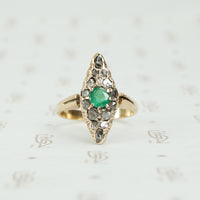Old Chunky Diamond Navette Ring with an Emerald