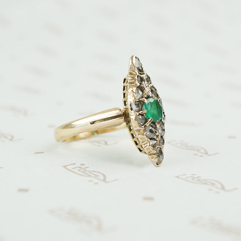 Old Chunky Diamond Navette Ring with an Emerald