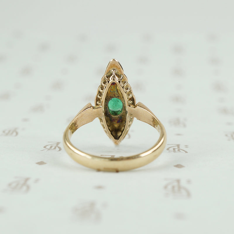 Old Chunky Diamond Navette Ring with an Emerald