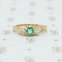 emerald and mine cut diamond ring