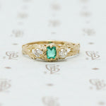 emerald and mine cut diamond ring