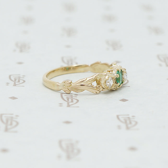 emerald and mine cut diamond ring side view