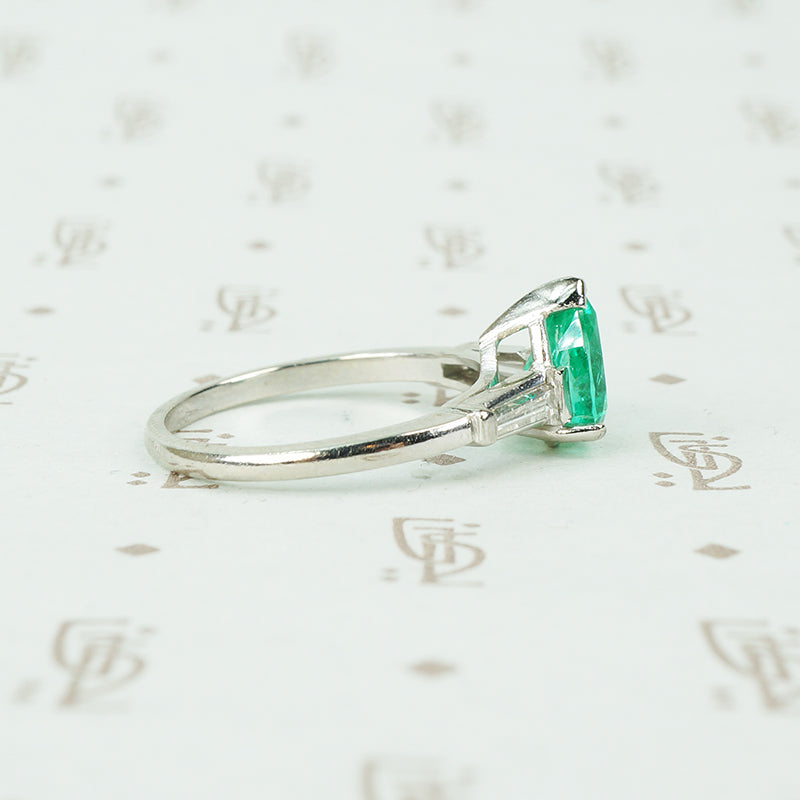 1.08 carat pear shaped emerald platinum baguette diamonds engagement ring