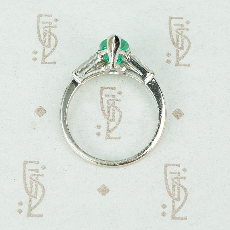 1.08 carat pear shaped emerald platinum baguette diamonds engagement ring