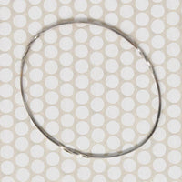 The Endless Twist Oval Bangle in Sterling from Allie B.