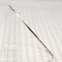The Endless Twist Oval Bangle in Sterling from Allie B.