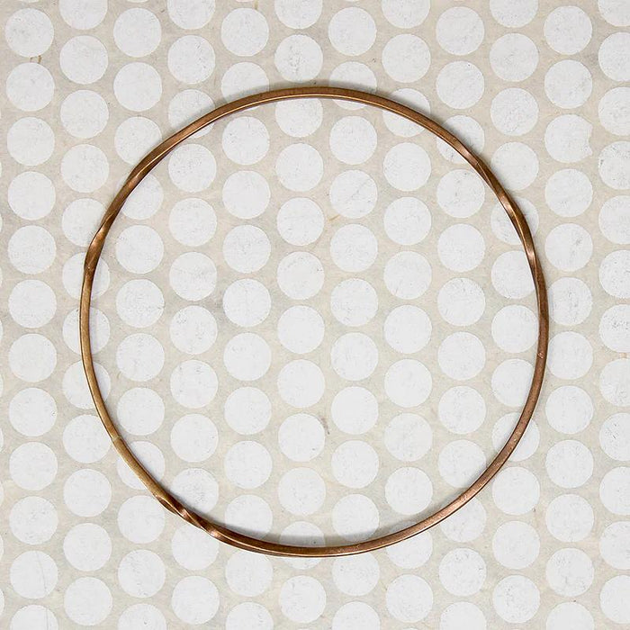 The Endless Twist Round Bangle in Bronze from Allie B.