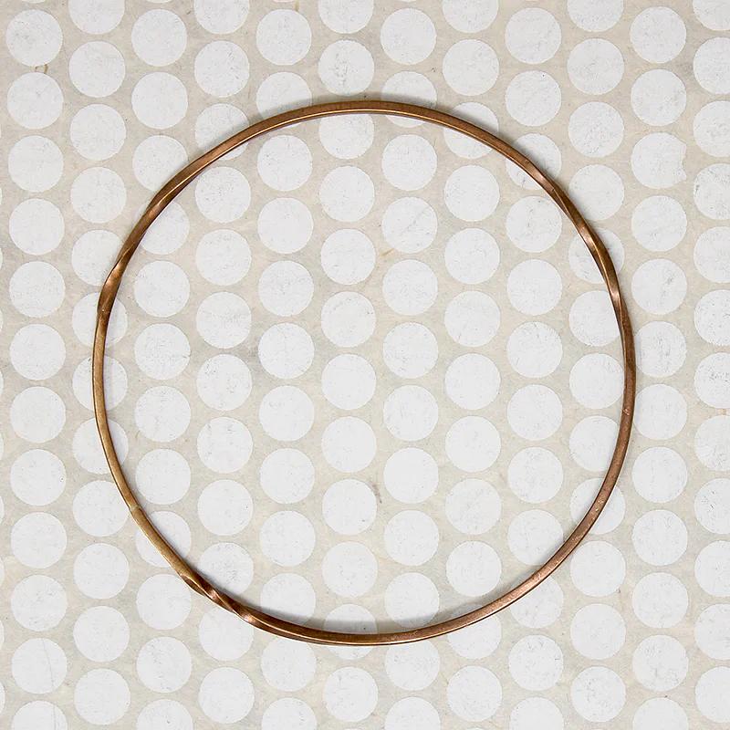 The Endless Twist Round Bangle in Bronze from Allie B.