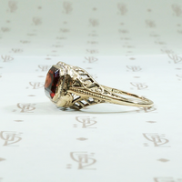 Emerald Cut Garnet in Art Deco Gold Ring