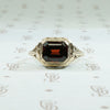Emerald Cut Garnet in Art Deco Gold Ring