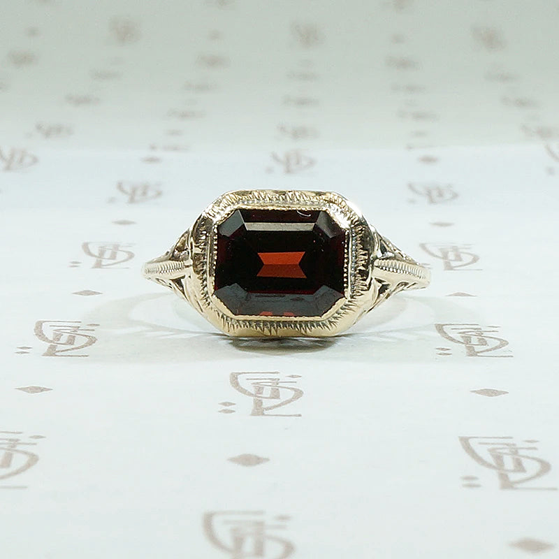 Emerald Cut Garnet in Art Deco Gold Ring