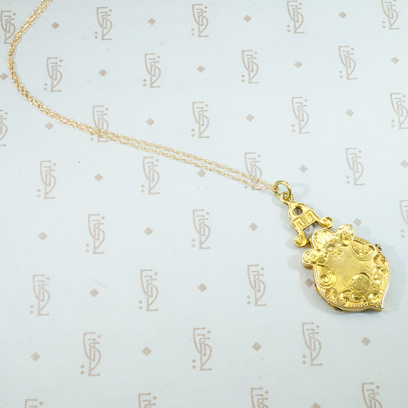 15k yellow gold engraved locket with roses and pansies