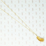 14k gold feather necklace