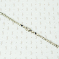 diamond and lab grown sapphire 18k white gold filigree bracelet circa 1920