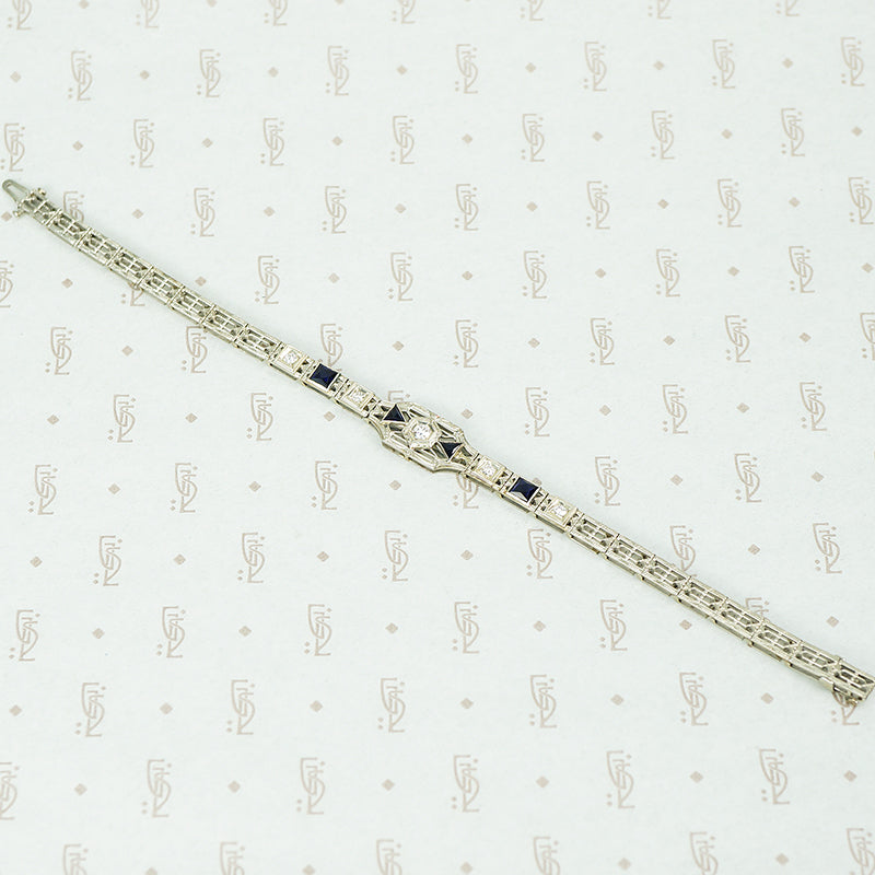 diamond and lab grown sapphire 18k white gold filigree bracelet circa 1920