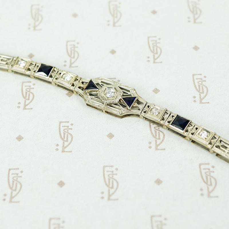 diamond and lab grown sapphire 18k white gold filigree bracelet circa 1920