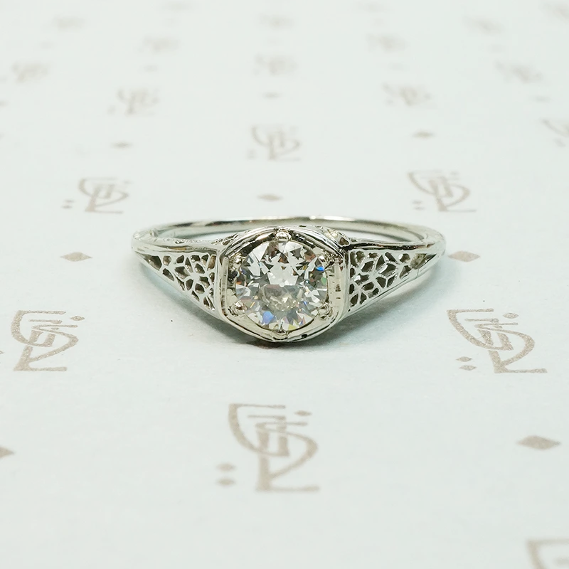 18k white gold art deco filigree engagement ring set with a .45 carat Old Euro diamond VVS