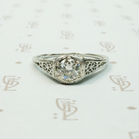 18k white gold art deco filigree engagement ring set with a .45 carat Old Euro diamond VVS