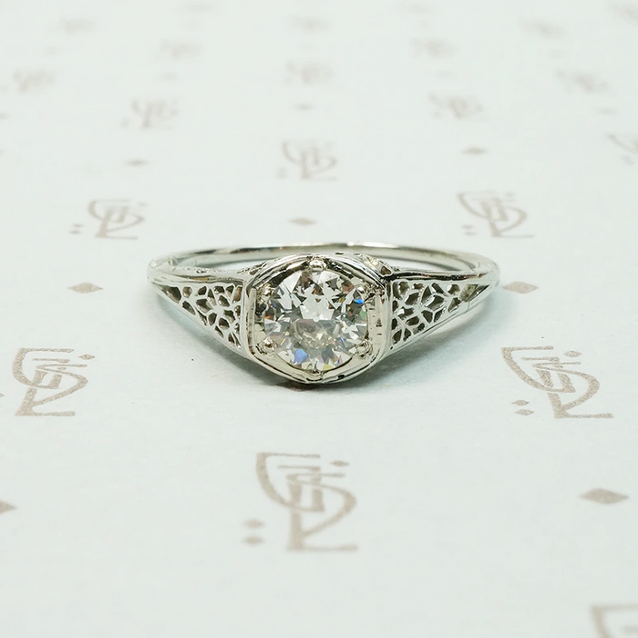 18k white gold art deco filigree engagement ring set with a .45 carat Old Euro diamond VVS