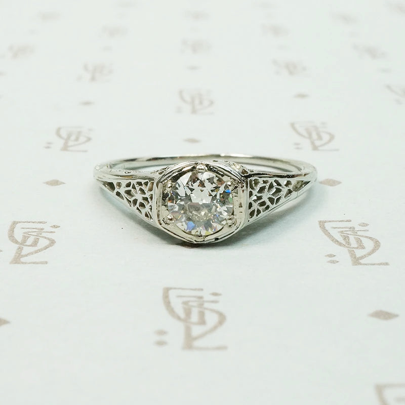 18k white gold art deco filigree engagement ring set with a .45 carat Old Euro diamond VVS