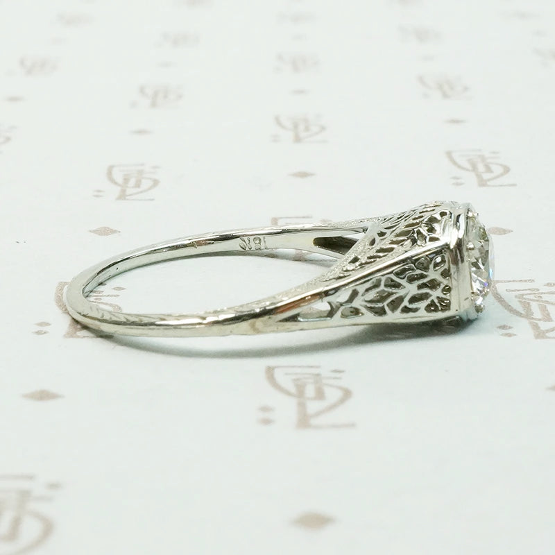 18k white gold art deco filigree engagement ring set with a .45 carat Old Euro diamond VVS