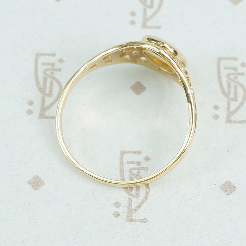 delicate yellow gold filigree opal ring side view