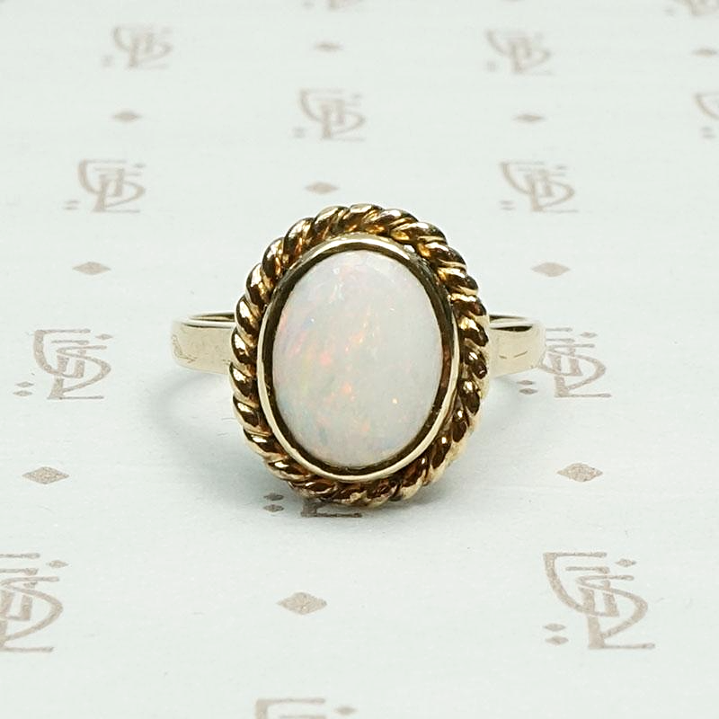 Oval Opal Ring with Gold Rope Detail