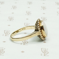 Oval Opal Ring with Gold Rope Detail, side view