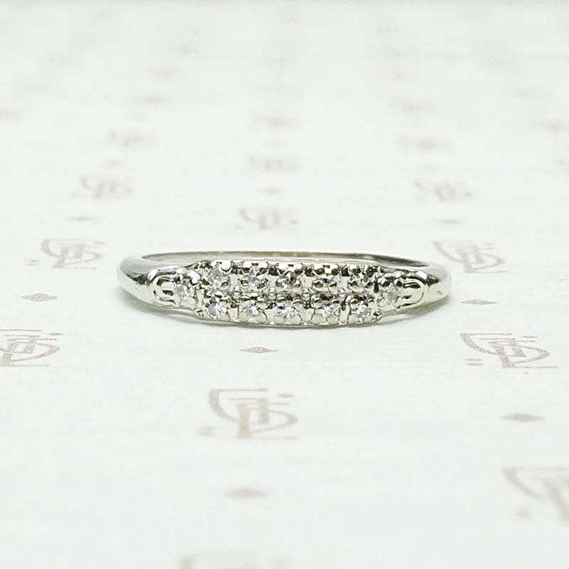 One Dozen Diamond Band in White Gold