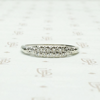 One Dozen Diamond Band in White Gold