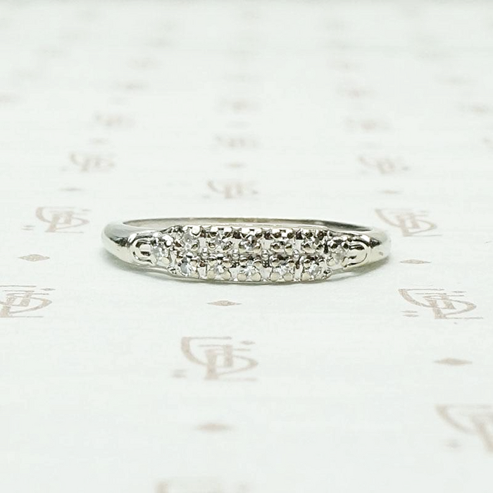 One Dozen Diamond Band in White Gold