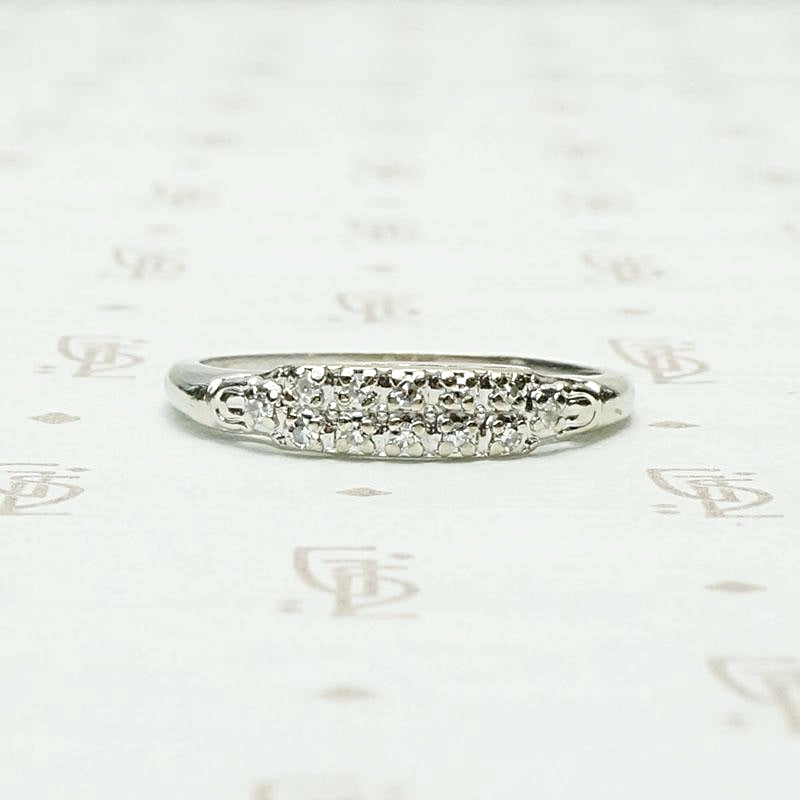 One Dozen Diamond Band in White Gold