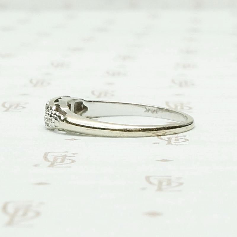 One Dozen Diamond Band in White Gold