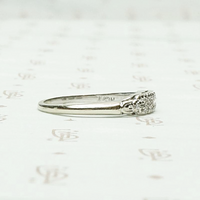 One Dozen Diamond Band in White Gold, side view