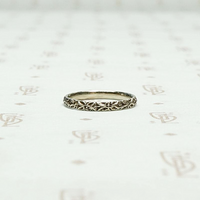 Wee White Gold Band with Irises, side view