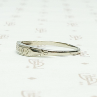 Forget Me Not Deco Diamond Wedding Band, left side.